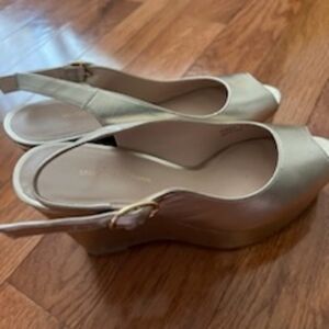 Gold Stuart Weitzman sling back platform wedge heels
